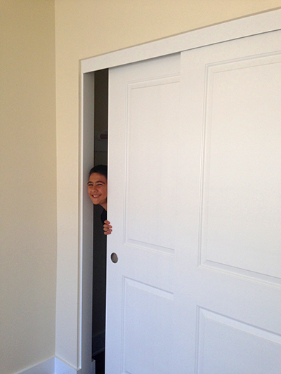 lucky new Habitat homeowner - a room of his own