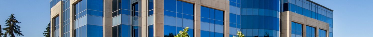 Q1 Property Reset: What Commercial Owners Should Address First Exterior view of a commercial office building with large glass windows